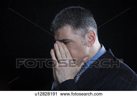Stock Image - Worried Businessman. Fotosearch