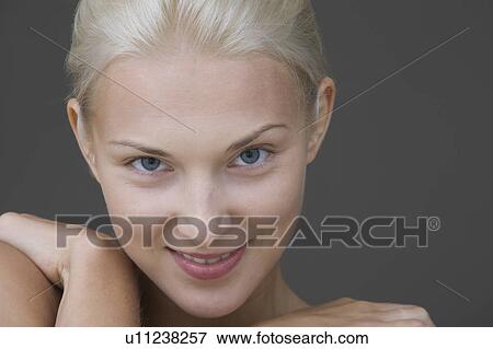 Young attractive woman smiling, headshot View Large Photo Image Stock Photo - Young attractive woman smiling, headshot. Fotosearch