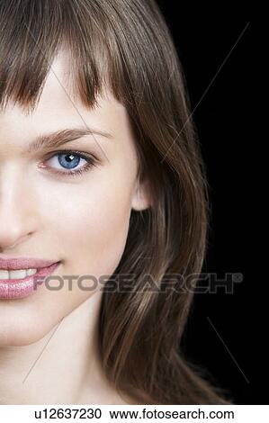 Young Brunette Woman With Blue Eyes View Large Photo Image Stock Image - Young Brunette Woman With Blue Eyes. Fotosearch