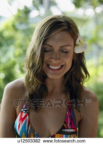 Young Woman in Bikini with Flower in Hair View Large Photo Image Stock Image - Young Woman in Bikini with Flower in Hair. Fotosearch