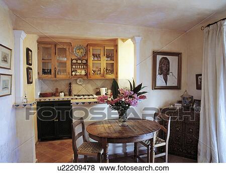 Antique Wooden Table And Chairs In Mallorcan Cottage Kitchen Dining Room Stock Photo U22209478 Fotosearch