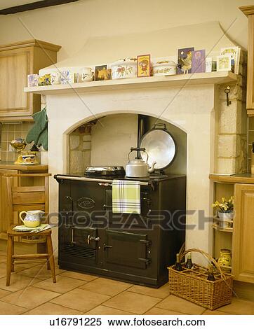 Black Aga oven in country kitchen View Large Photo Image Stock Photography - Black Aga oven in country kitchen. Fotosearch