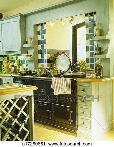 Black double Aga oven in country kitchen View Large Photo Image Stock Image - Black double Aga oven in country kitchen. Fotosearch