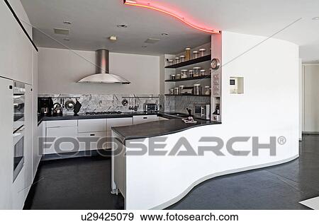 Black flooring in modern open-plan loft conversion kitchen View Large Photo Image Stock Photo - Black flooring in modern open-plan loft conversion kitchen. Fotosearch
