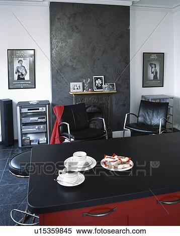 Black table in modern dining room View Large Photo Image Stock Photography - Black table in modern dining room. Fotosearch