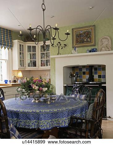 Blue cloth on table in pale green kitchen dining room View Large Photo Image Stock Photo - Blue cloth on table in pale green kitchen dining room. Fotosearch