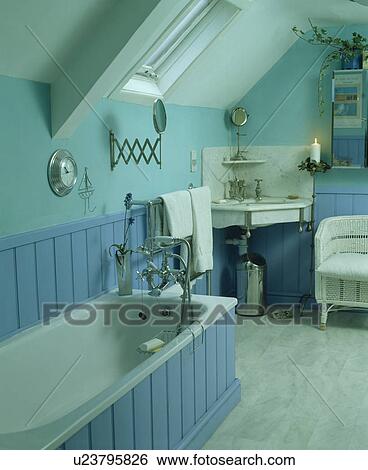 Blue panelled bath in pastel turquoise bathroom View Large Photo Image Stock Photograph - Blue panelled bath in pastel turquoise bathroom. Fotosearch