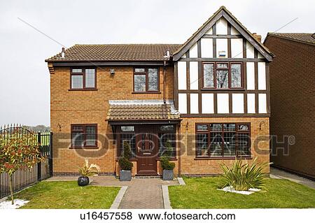 Brick and timbered newbuild house on small housing estate in the country View Large Photo Image Stock Photo - Brick and timbered newbuild house on small housing estate in the country. Fotosearch