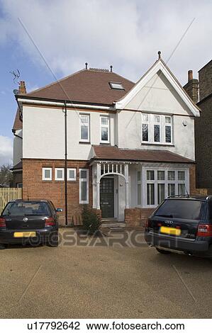 Cars on drive outside detached Edwardian house View Large Photo Image Stock Image - Cars on drive outside detached Edwardian house. Fotosearch