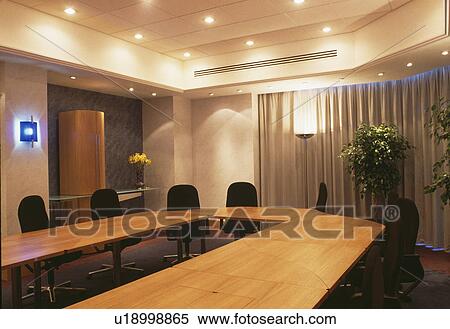 Ceiling Lighting Above Table In Meeting Room In Modern