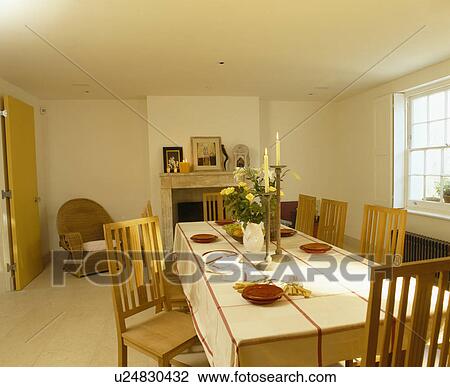 Checked cloth on table in modern country dining room View Large Photo Image Stock Image - Checked cloth on table in modern country dining room. Fotosearch