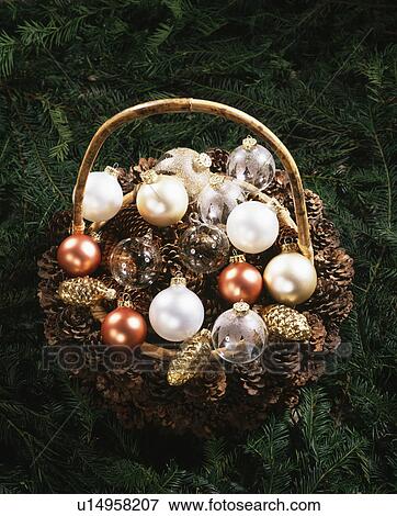 Close-up of basket of Christmas baubles View Large Photo Image Stock Photo - Close-up of basket of Christmas baubles. Fotosearch