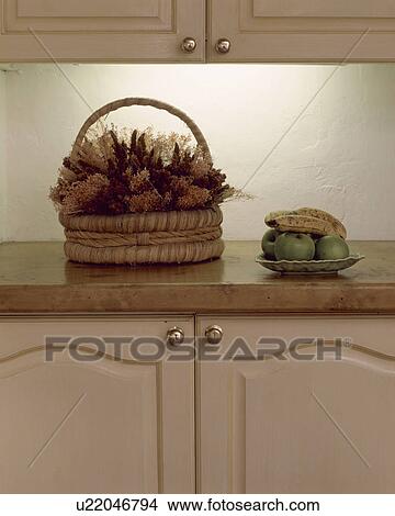 Close-up of basket of dried flowers on kitchen worktop View Large Photo Image Picture - Close-up of basket of dried flowers on kitchen worktop. Fotosearch
