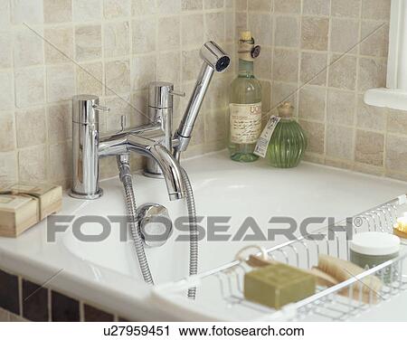 Close-up of bath with chrome taps View Large Photo Image Stock Image - Close-up of bath with chrome taps. Fotosearch
