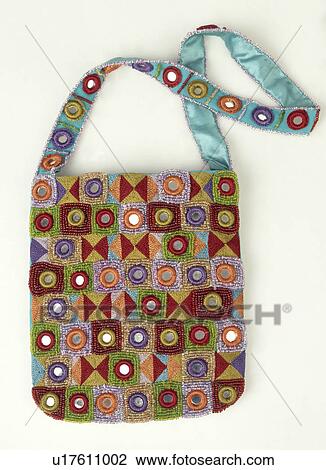 Close-up of bead embroidered and mirrored Indian-style hand-bag View Large Photo Image Stock Image - Close-up of bead embroidered and mirrored Indian-style hand-bag. Fotosearch