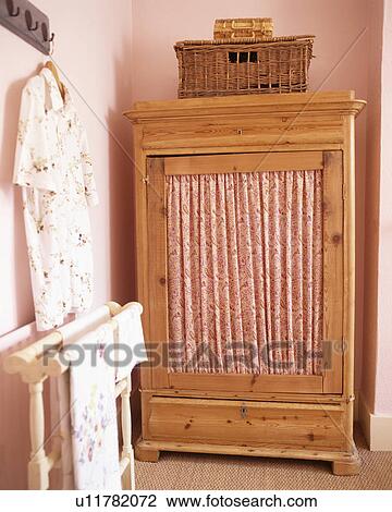 Stock Image - Close-up of bedside table. Fotosearch