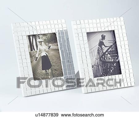 Close-up of black+white fashion photographs in mother-of-pearl frames View Large Photo Image Stock Photo - Close-up of black+white fashion photographs in mother-of-pearl frames. Fotosearch