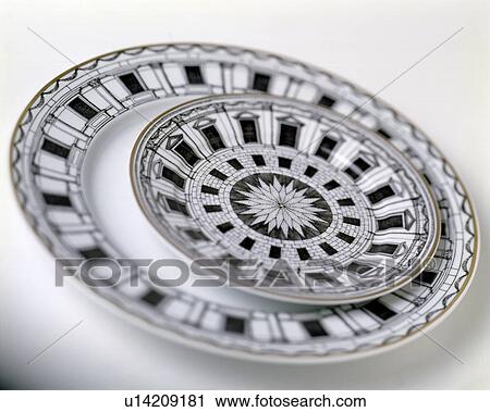 Close-up of black+white patterned Fornasetti china plates View Large Photo Image Stock Image - Close-up of black+white patterned Fornasetti china plates. Fotosearch