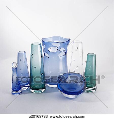 Close-up of blue and green decorative glass vases and bowl View Large Photo Image Stock Image - Close-up of blue and green decorative glass vases and bowl. Fotosearch