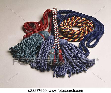 Close-up of blue and red silk tasselled tie-backs View Large Photo Image Stock Photo - Close-up of blue and red silk tasselled tie-backs. Fotosearch