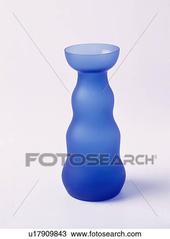 Close-up of blue glass vase View Large Photo Image Stock Image - Close-up of blue glass vase. Fotosearch
