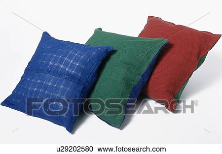 Close-up of blue, green and red cushions View Large Photo Image Stock Image - Close-up of blue, green and red cushions. Fotosearch