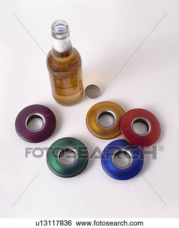Close-up of bottle of beer with cylindrical glass tops View Large Photo Image Stock Photograph - Close-up of bottle of beer with cylindrical glass tops. Fotosearch