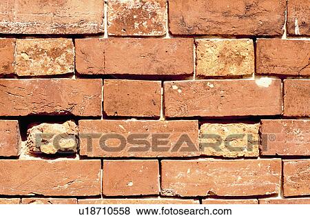 Close-up of brick wall in need of repair View Large Photo Image Stock Photo - Close-up of brick wall in need of repair. Fotosearch