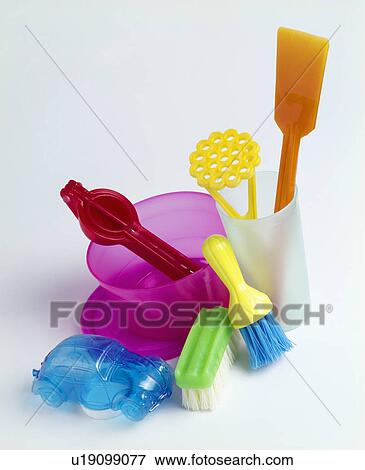 Close-up of brightly coloured plastic utensils and brushes View Large Photo Image Stock Photo - Close-up of brightly coloured plastic utensils and brushes. Fotosearch