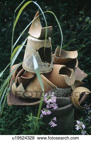 Close-up of broken terracotta pots View Large Photo Image Stock Photo - Close-up of broken terracotta pots. Fotosearch