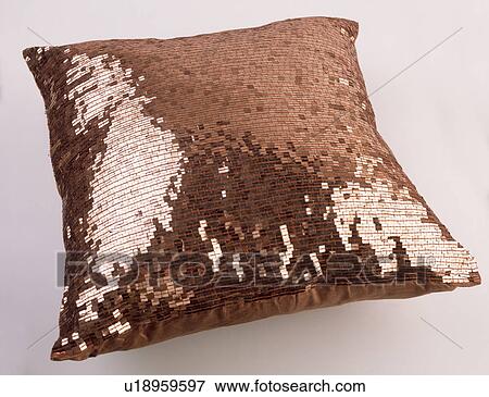 Close-up of bronze sequinned cushion View Large Photo Image Stock Photo - Close-up of bronze sequinned cushion. Fotosearch