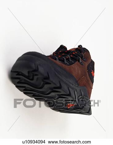 Close-up of brown and black trainer shoe View Large Photo Image Picture - Close-up of brown and black trainer shoe. Fotosearch