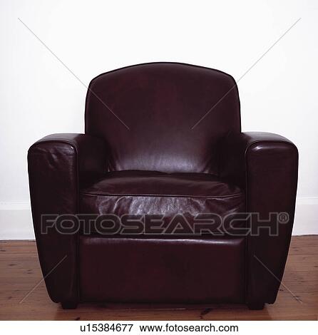 Close-up of brown leather armchair View Large Photo Image Stock Photo - Close-up of brown leather armchair. Fotosearch