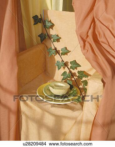 Picture - Close-up of chair with linen loosecover. Fotosearch