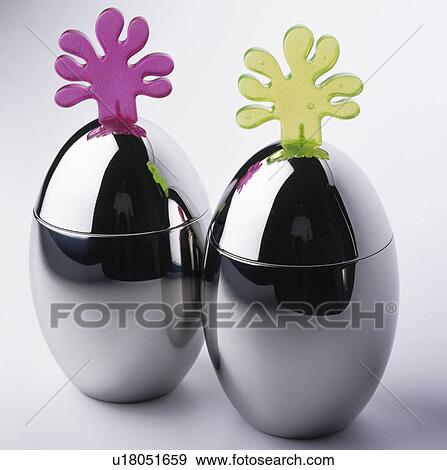 Close-up of chrome salt and pepper pots with purple and green plastic tops View Large Photo Image Stock Photo - Close-up of chrome salt and pepper pots with purple and green plastic tops. Fotosearch