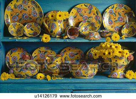 Stock Photo - Close-up of collection of Mary-Rose Young colourful pottery crockery. Fotosearch