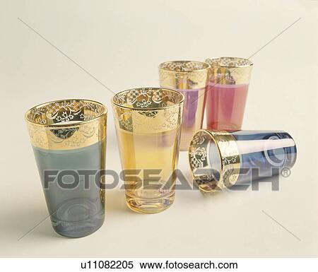 Close-up of colourful glass Moroccan tea-glasses with gold rims View Large Photo Image Stock Photography - Close-up of colourful glass Moroccan tea-glasses with gold rims. Fotosearch