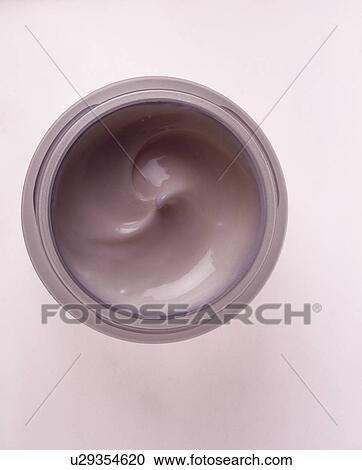 Close-up of cosmetic cream in pot View Large Photo Image Stock Image - Close-up of cosmetic cream in pot. Fotosearch