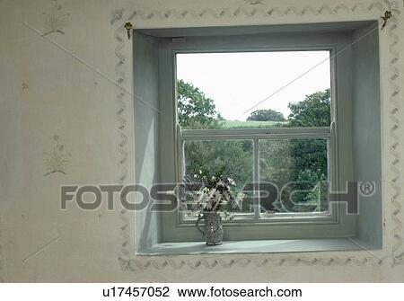 Close-up of cottage window with stencilled border and blue frame View Large Photo Image Stock Image - Close-up of cottage window with stencilled border and blue frame. Fotosearch