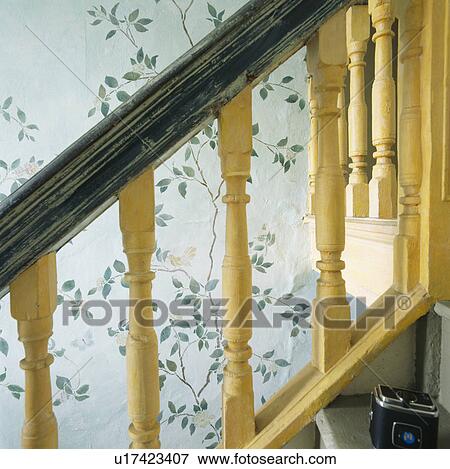 Close-up of cream bannisters on staircase with stencilled wall View Large Photo Image Stock Photo - Close-up of cream bannisters on staircase with stencilled wall. Fotosearch
