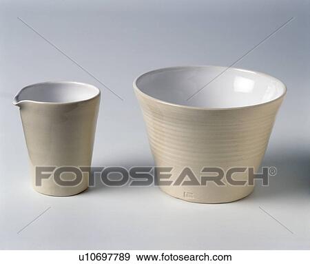 Close-up of cream pottery bowl and jug View Large Photo Image Stock Photo - Close-up of cream pottery bowl and jug. Fotosearch