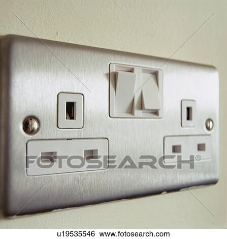 Stock Photograph - Close-up of double electric plug-socket. Fotosearch