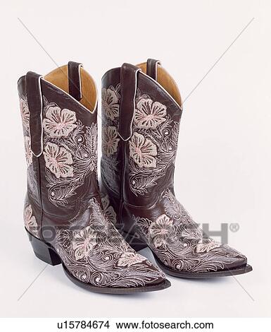 Close-up of elaborately embroidered leather cowboy boots View Large Photo Image Picture - Close-up of elaborately embroidered leather cowboy boots. Fotosearch