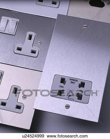 Close-up of electric plug sockets before installation View Large Photo Image Stock Photo - Close-up of electric plug sockets before installation. Fotosearch