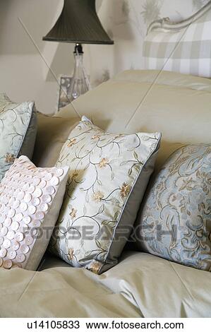 Close-up of embroidered silk cushion with cushion covered with mother-of-pearl buttons View Large Photo Image Stock Image - Close-up of embroidered silk cushion with cushion covered with mother-of-pearl buttons. Fotosearch