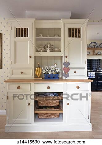 Close Up Of Fitted Cream Kitchen Dresser Stock Image U14415590