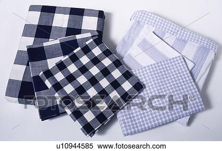 Close-up of folded dark blue and light blue checked cotton bed-linen View Large Photo Image Stock Photography - Close-up of folded dark blue and light blue checked cotton bed-linen. Fotosearch
