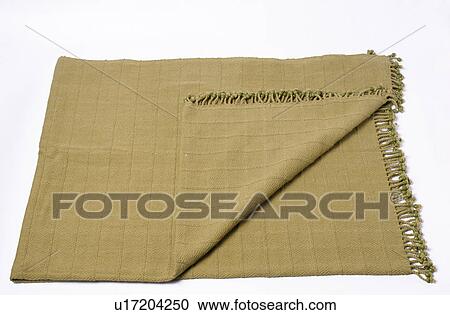 Close-up of folded green-beige throw View Large Photo Image Stock Image - Close-up of folded green-beige throw. Fotosearch