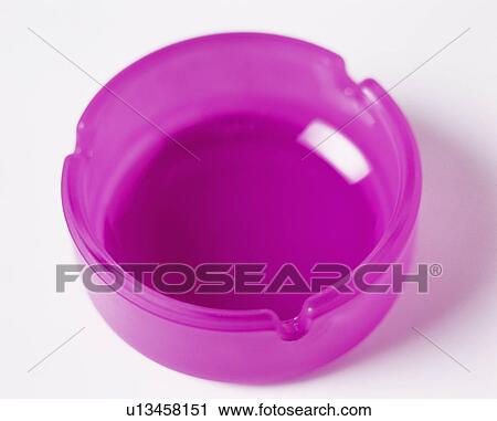 Close-up of fuchsia pink glass ashtray View Large Photo Image Stock Image - Close-up of fuchsia pink glass ashtray. Fotosearch