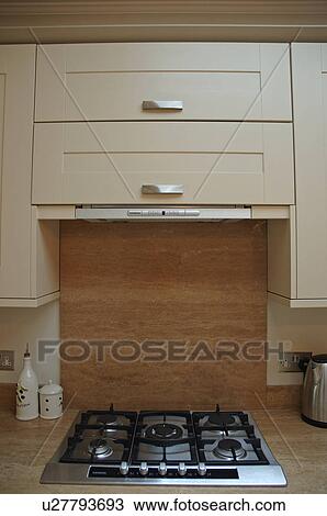 Stock Image - Close-up of gas hob in modern kitchen. Fotosearch